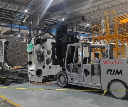 International machinery movers CNC installation Mexico facility AZVIR